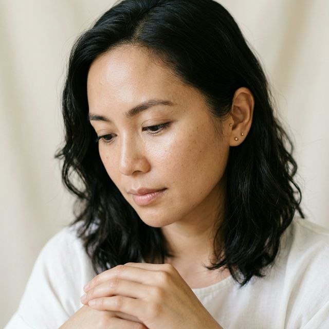 Filipina woman beauty close-up, dewy radiant skin